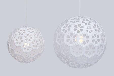 Flower Ball is a series of sphere geometric pendant lamp shades made with Japanese paper.